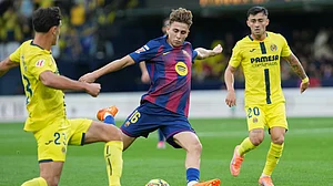 AP : Villarreal host Barcelona for a top-of-the-table La Liga clash.