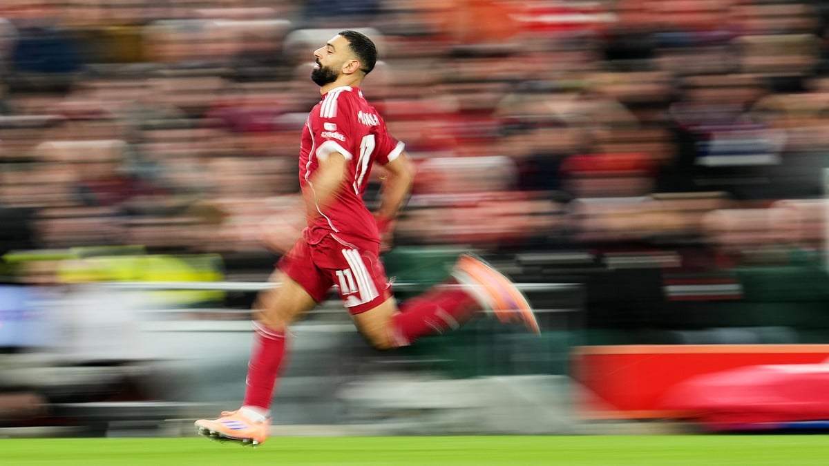 | Photo: AP/Jon Super : Liverpool's Mohamed Salah in action during the English Premier League soccer match between Liverpool and Brighton and Hove Albion in Liverpool, England, Saturday, Dec. 13, 2025.