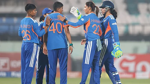 | Photo: X/BCCIWomen : India Womens Kranti Goud celebrates with teammates after a run-out during the first T20I match against Sri Lanka Women on December 21, 2025.