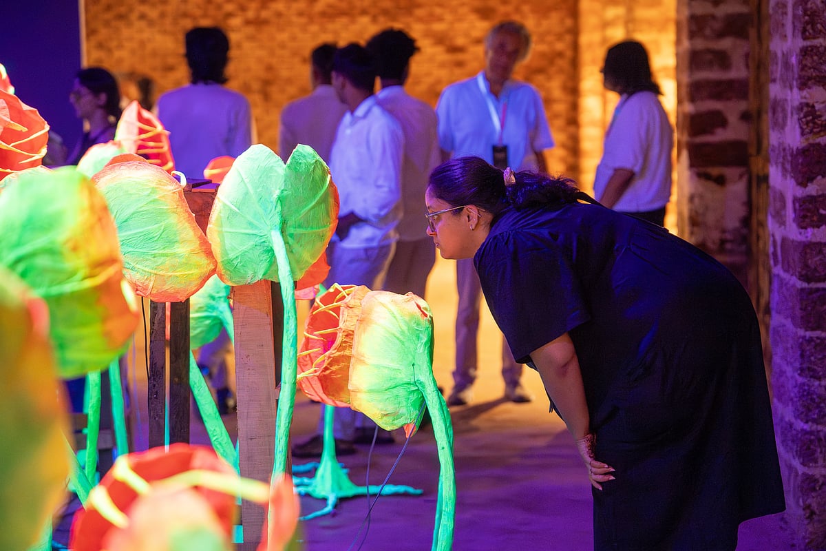 Courtesy of the Kochi Biennale Foundation. : Visitors at Dhiraj Rabha’ work, The Quiet Weight of Shadows (2025)