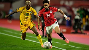 AP/Mosa'ab Elshamy : Zimbabwe's Daniel Msendami, left, and Egypt's Mostafa Fathy fight for the ball during the Africa Cup of Nations group B soccer match.