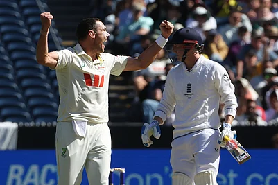 | Photo: AP/Hamish Blair : Australias Scott Boland, left, successfully appeals for a LBW on Englands Harry Brook, right, during their Ashes cricket test match in Melbourne.