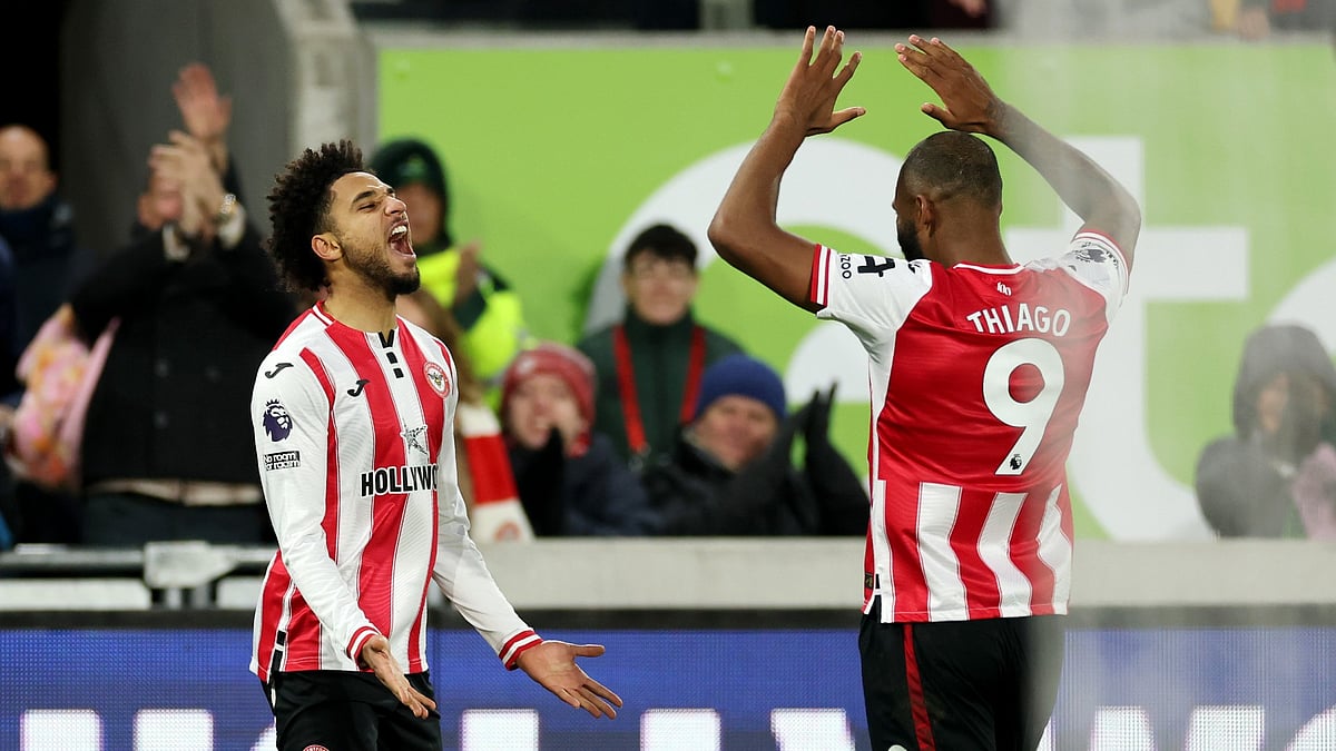 Kevin Schade celebrates one of his three goals with Igor Thiago as Brentford thrash Bournemouth 4-1.