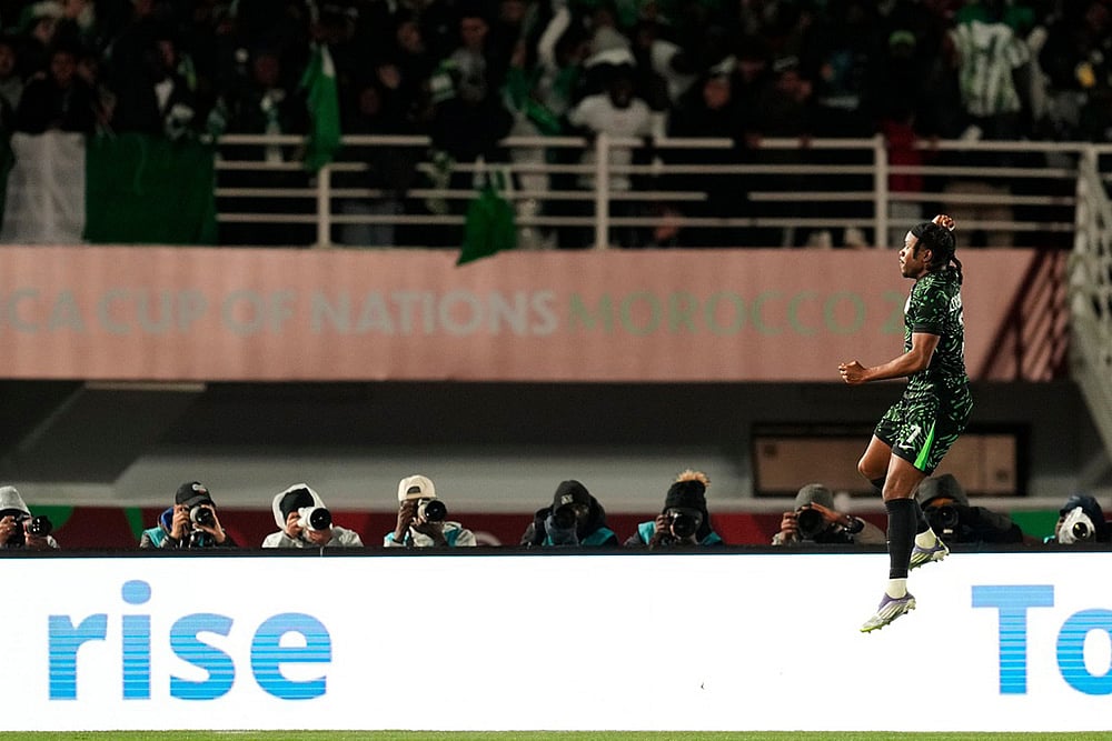 | Photo: AP/Mosaab Elshamy : Nigerias Ademola Lookman celebrates after scoring his sides third goal during the Africa Cup of Nations group C soccer match between Nigeria and Tunisia in Fez, Morocco.