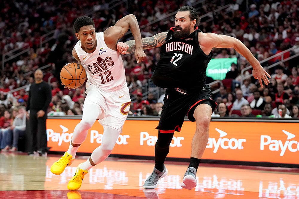 | Photo: AP/Eric Christian Smith : Cleveland Cavaliers forward DeAndre Hunter, left, drives to the basket as Houston Rockets center Steven Adams, right, defends during the second half of an NBA basketball game in Houston.