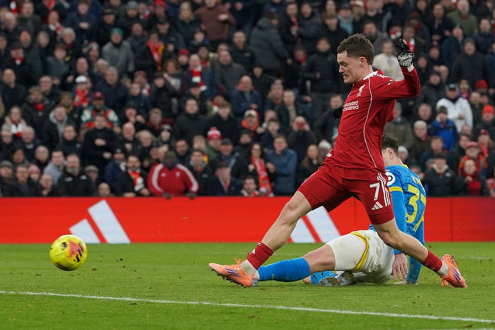 | Photo: AP/Ian Hodgson : Liverpools Florian Wirtz scores his sides second goal during the English Premier League soccer match between Liverpool and Wolverhampton Wanderers in Liverpool.