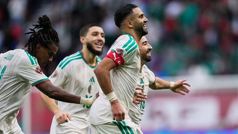 | Photo: AP/Mosa'ab Elshamy : Algeria's Riyad Mahrez celebrates after scoring his side's second goal during the Africa Cup of Nations group E soccer match between Algeria and Sudan in Rabat, Morocco.