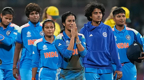 AP : Jemimah Rodrigues, centre, reacts after helping India win the ICC Womens Cricket World Cup semi-final against Australia in Navi Mumbai.