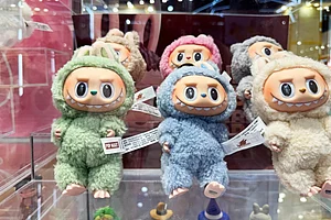 Shutterstock : Labubu collectible toy from The Monsters by Pop Mart on display with surprise boxes. Popular designer art figure seen in stores, videos, TikTok, reels, shorts