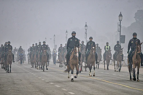 | Photo: PTI : Indian Presidents Bodyguard on horses during rehearsals ahead of Republic Day celebrations at Kartavya path, in New Delhi.