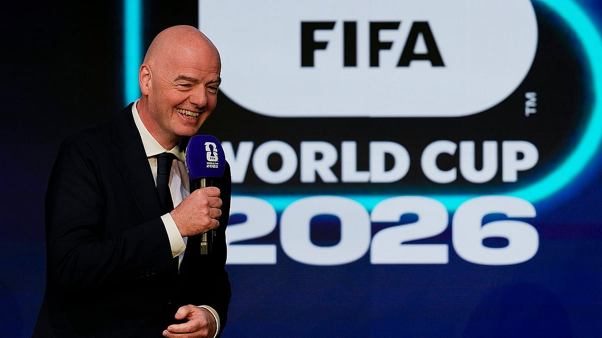 | Photo: AP/Chris Carlson : FIFA President Gianni Infantino speaks during the match schedule reveal for the 2026 soccer World Cup in Washington, Saturday, Dec. 6, 2025. 
