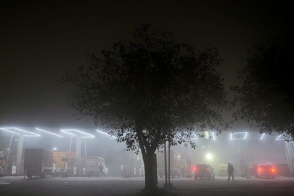 | Photo: PTI/Salman Ali : The IMD has issued a yellow alert, cautioning that dense fog is likely at many isolated places till forenoon.