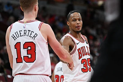 | Photo: AP/Paul Beaty : Chicago Bulls Isaac Okoro (35) celebrates with teammate Kevin Huerter (13) during the final seconds of an NBA basketball game against the New Orleans Pelicans in Chicago.