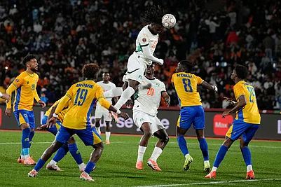 | Photo: AP/Themba Hadebe : Ivory Coasts Evann Guessand scores during the Africa Cup of Nations group F soccer match between Gabon and Ivory Coast, in Marrakech, Morocco.