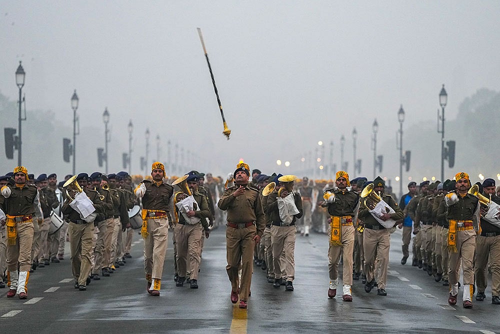 | Photo: PTI/Ravi Choudhary : Central Industrial Security Force (CISF) officials during a rehearsal ahead of the Republic Day, at Kartavya Path in New Delhi.