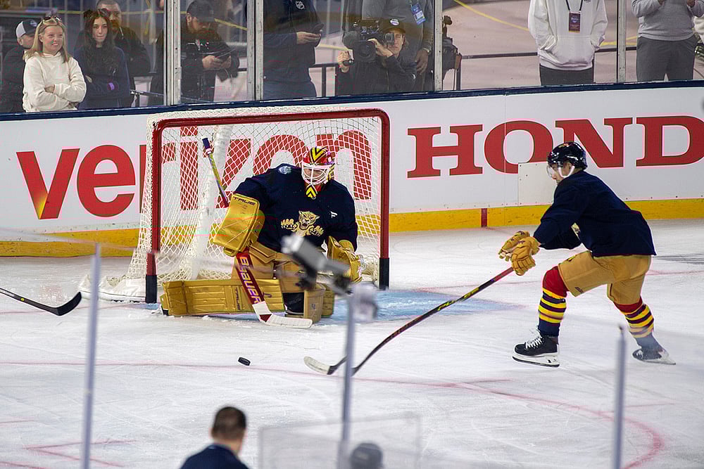 | Photo: AP/Michael Laughlin : Florida Panthers goalie Sergei Bobrovsky, center, workds out during practice for the NHL Winter Classic outdoor hockey game at loanDepot Park, in Miami. 