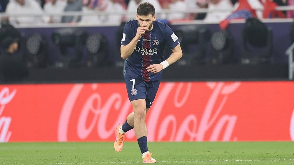 | Photo: AP/Hussein Sayed : PSG's Khvicha Kvaratskhelia celebrates after scoring his side's opening goal during the FIFA Intercontinental Cup final soccer match between Flamengo and Paris Saint-Germain in Doha, Qatar.