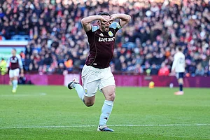 | Photo: Martin Rickett/PA via AP : Aston Villa's John McGinn celebrates scoring their side's third goal during their English Premier League soccer match in Birmingham, England.
