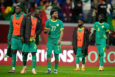| Photo: AP/Mosaab Elshamy : Senegal players walk off the pitch after the Africa Cup of Nations best of 16 soccer match between Senegal and Sudan in Tangier, Morocco.