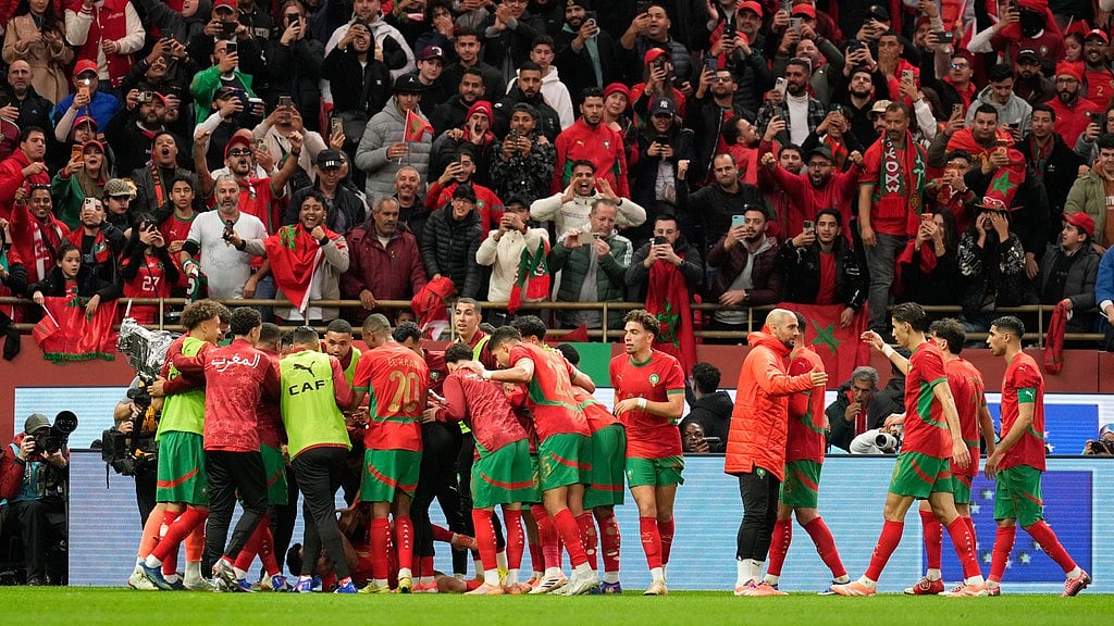 Photo: AP : Moroccan players celebrate after teammate Brahim Diaz scored the winning goal during the Africa Cup of Nations round of 16 match against Tanzania in Rabat.