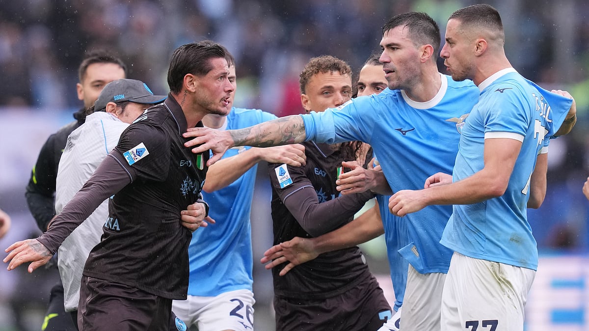 | Photo: Alfredo Falcone/LaPresse via AP : Napoli's Pasquale Mazzocchi, left, and Lazio's Adam Marusic during the Italian Serie A soccer match between SS Lazio and SSC Napoli in Rome, Sunday, Jan. 4, 2026. 