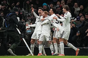 | Photo: AP/Alastair Grant : Fulham's Harrison Reed celebrates after scoring his side's second goal during the English Premier League soccer match between Fulham and Liverpool in London.