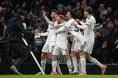 | Photo: AP/Alastair Grant : Fulhams Harrison Reed celebrates after scoring his sides second goal during the English Premier League soccer match between Fulham and Liverpool in London.
