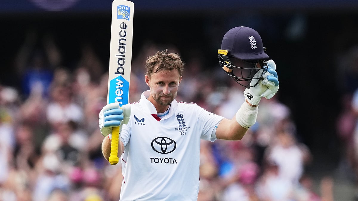 | Photo: AP/Mark Baker : Englands Joe Root celebrates after scoring a century during play on day two of the fifth and final Ashes cricket test between England and Australia in Sydney, Monday, Jan. 5, 2026. 