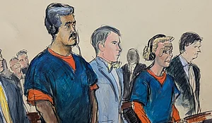 Elizabeth Williams via AP : In this courtroom sketch, Venezuelan President Nicolas Maduro, left, and his wife, Cilia Flores, second from right, appear in Manhattan federal court with their defense attorneys Mark Donnelly, second from left, and Andres Sanchez, Monday, Jan. 5, 2026, in New York.