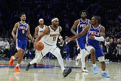 | Photo: AP/Matt Rourke : Denver Nuggets Bruce Brown (11) tries to get past Philadelphia 76ers Tyrese Maxey, right, during overtime of an NBA basketball game in Philadelphia.