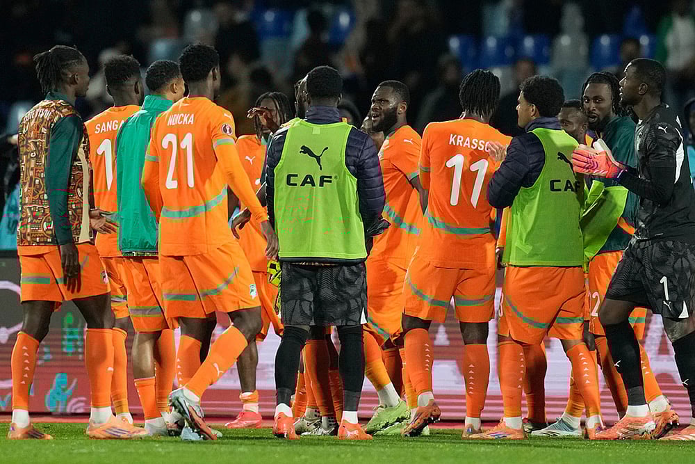 | Photo: AP/Themba Hadebe : Ivory Coasts players celebrate after the Africa Cup of Nations best of 16 soccer match between Ivory Coast and Burkina Faso in Marrakech, Morocco.