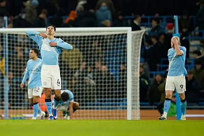 | Photo: AP/Dave Thompson : Manchester Citys Tijjani Reijnders, left, and Manchester Citys Erling Haaland react at the end of the English Premier League soccer match between Manchester City and Brighton and Hove Albion in Manchester, England.