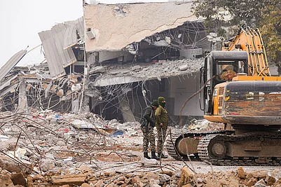 | Photo: PTI/Ravi Choudhary : Security personnel stand guard near the Syed Faiz Elahi mosque after the demolition of alleged encroachments on land adjoining the mosque, carried out by the Municipal Corporation of Delhi (MCD), in the Turkman Gate area of New Delhi.