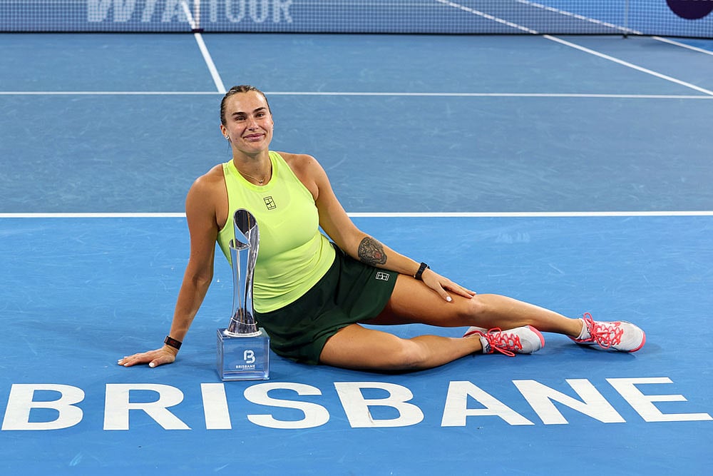 | Photo: AP/Tertius Pickard : Aryna Sabalenka of Belarus poses with the winners trophy after winning the womens final match against Marta Kostyuk of Ukraine 6-4, 6-3, at the Brisbane International tennis tournament in Brisbane, Australia.