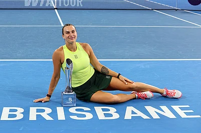 | Photo: AP/Tertius Pickard : Aryna Sabalenka of Belarus poses with the winners trophy after winning the womens final match against Marta Kostyuk of Ukraine 6-4, 6-3, at the Brisbane International tennis tournament in Brisbane, Australia.