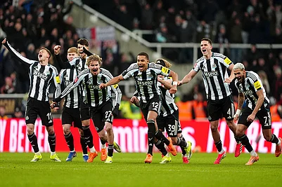 | Photo: Owen Humphreys/PA via AP : Newcastle United players celebrate winning the penalty shoot-out after the FA Cup third round soccer match between Newcastle United and Bournemouth in Newcastle, England.