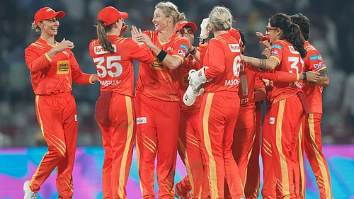 | Photo: X/wplt20 : Gujarat Giants Sophie Devine celebrates a wicket during the Womens Premier League match against Delhi Capitals on January 11, 2026.