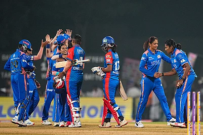 | Photo: PTI/Kunal Patil : Mumbai Indians players being congratulated by Delhi Capitals Shree Charani and Nandani Sharma after winning the Womens Premier League (WPL) T20 cricket match between Mumbai Indians and Delhi Capitals, at the DY Patil Stadium, in Navi Mumbai.