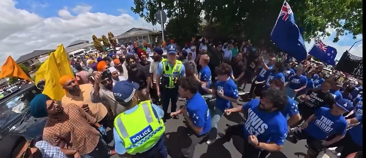 Screengrab : Participants in the Sikh procession were seen continuing their march despite the disruption, while some attempted to engage verbally with the protesters. There were no immediate reports of physical violence, and police presence was visible in the area to prevent escalation.

