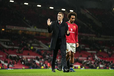 | Photo: AP/Jon Super : Manchester Uniteds interim manager Darren Fletcher and Manchester Uniteds Joshua Zirkzee walk off the pitch after the FA Cup third round soccer match between Manchester United and Brighton in Manchester, England.