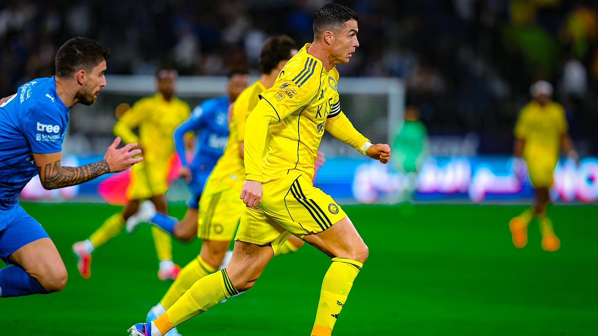 | Photo: X/AlNassrFC_EN : Al-Nassr's Cristiano Ronaldo in action during the Saudi Pro League match against Al-Hilal on January 13, 2026.
