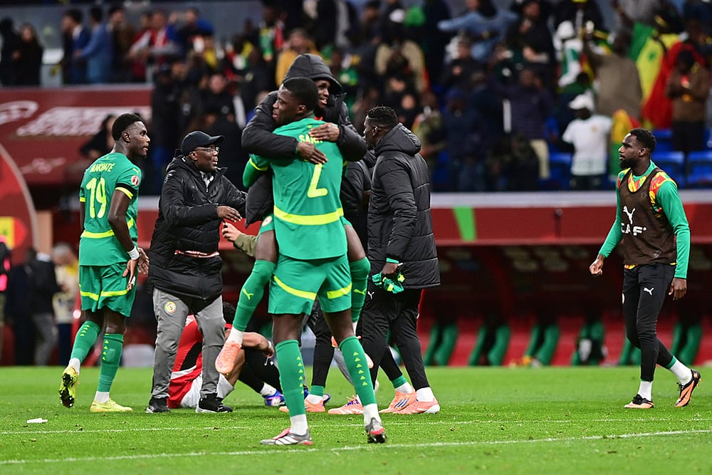 | Photo: AP/Mohamed Bounaji : Senegal players celebrate their victory after the Africa Cup of Nations semifinal soccer match between Senegal and Egypt, in Tangier, Morocco.