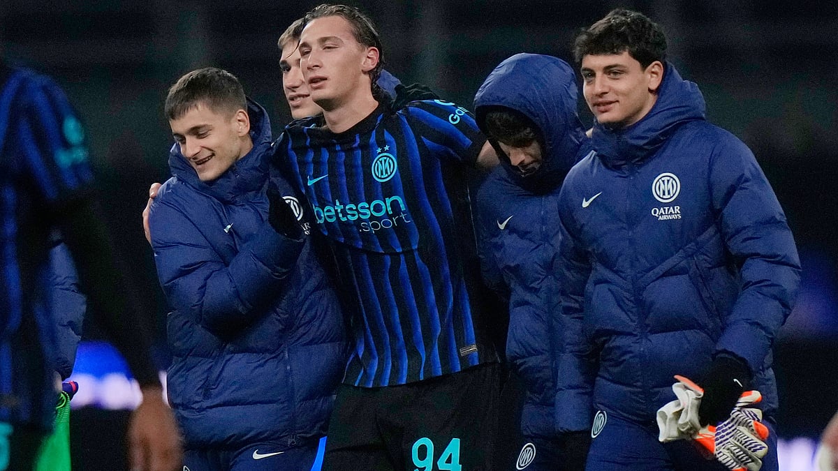 | Photo: AP/Luca Bruno : Inter Milans Francesco Pio Esposito, centre, reacts with his teammates at the end of the Serie A soccer match between Inter Milan and Lecce in Milan, Italy, Wednesday, Jan. 14, 2026.