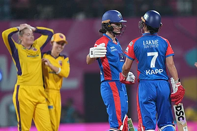 | Photo: PTI/Kunal Patil : Delhi Capitals Laura Wolvaardt and Marizanne Kapp wait for third umpires decision regarding the latters wicket after a review by UP Warriorz during the Womens Premier League (WPL) 2026 T20 cricket match between UP Warriorz and Delhi Capitals, at the DY Patil Stadium, in Navi Mumbai.