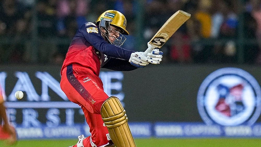 | Photo: AP/Shailendra Bhojak : WPL 2025, RCB vs GG: Royal Challengers Bengaluru’s captain Smriti Mandhana plays a shot 