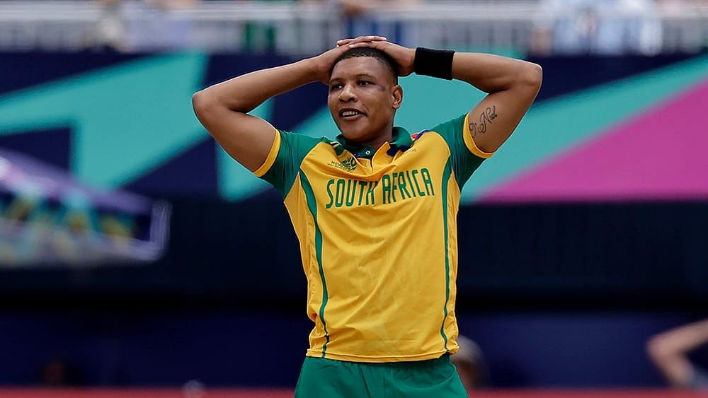 | Photo: AP/Adam Hunger : South Africas Ottniel Baartman