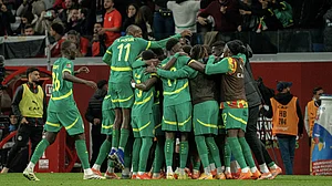 File : Senegal's players celebrate during their semi-final win over Egypt