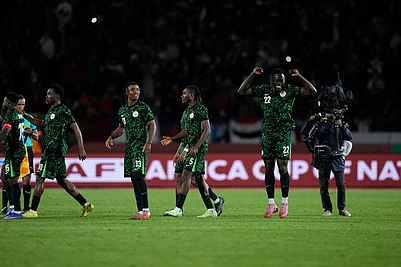| Photo: AP/Themba Hadebe : Nigeria national team react after winning on penalties during the Africa Cup of Nations third place game between Egypt and Nigeria in Casablanca, Morocco.