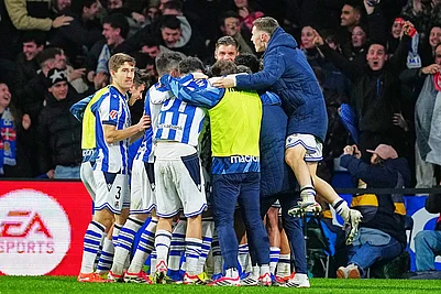 | Photo: AP/Miguel Oses : Real Sociedad players celebrate their victory at the Spanish La Liga soccer match between Real Sociedad and Barcelona in San Sebastian, Spain.