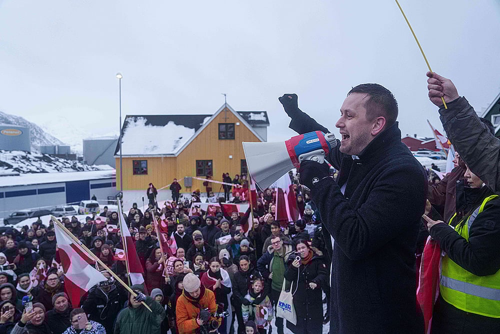| Photo: AP/Evgeniy Maloletka : Greenlandic Prime Minister Jens-Frederik Nielsen speaks during a protest against Trumps policy towards Greenland in front of the US consulate in Nuuk, Greenland.